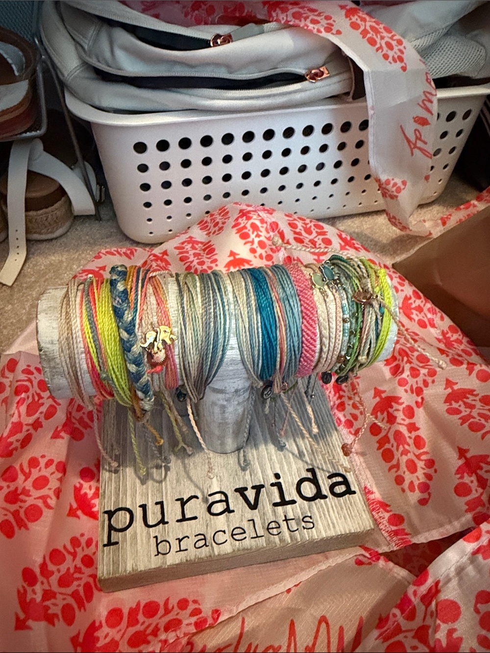 Pura Vida Bracelets on the stand